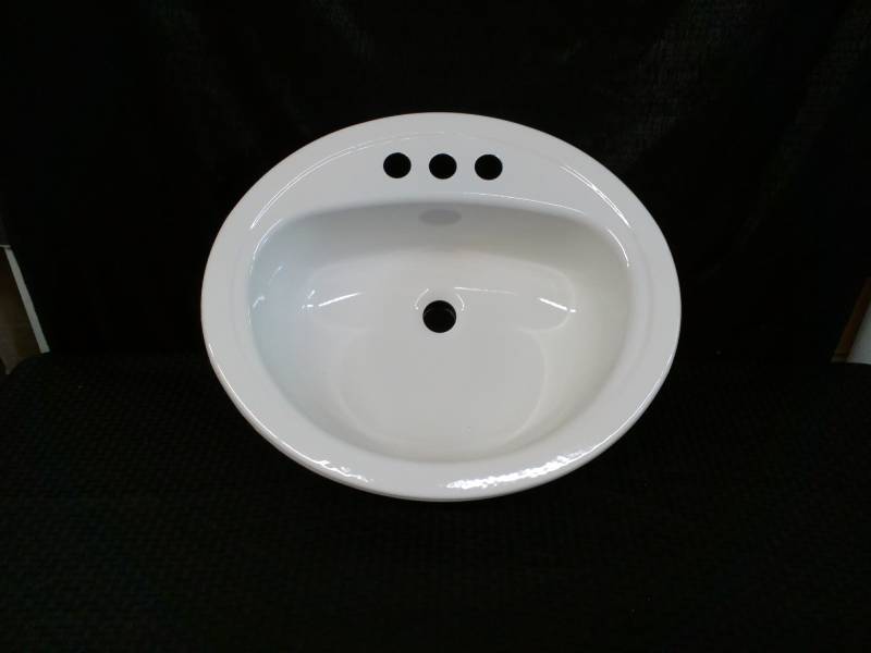 lot 147 image: Enameled Steel Oval Lavatory Sink