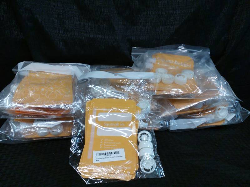 lot 238 image: Squish Delish Reusable Baby Food Pouches