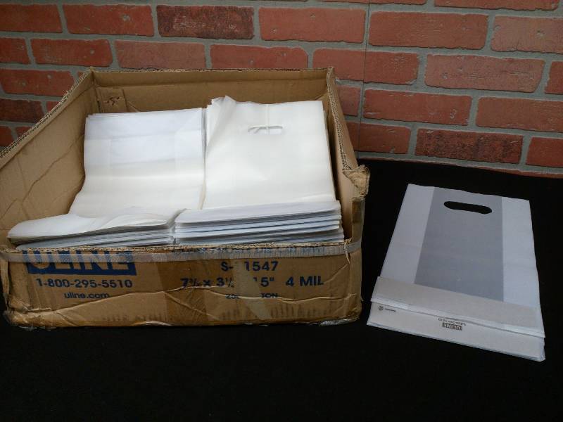 lot 266 image: ULINE Clear Frosty Die Cut Bags