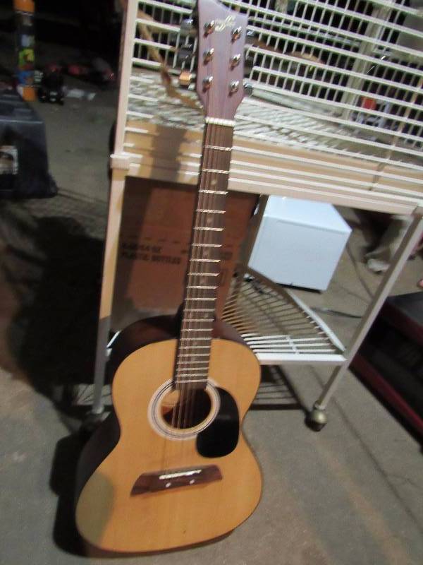 lot 7671 image: Acoustic Guitar - 6 string - First Act