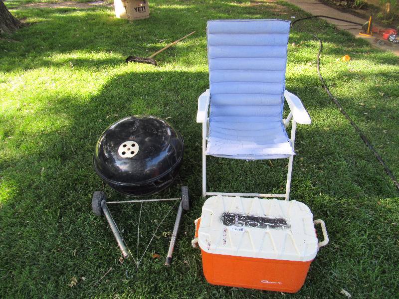 lot 197 image: Charcoal Grill (missing leg)  Orange & White Cooler  Blue Patio Chair