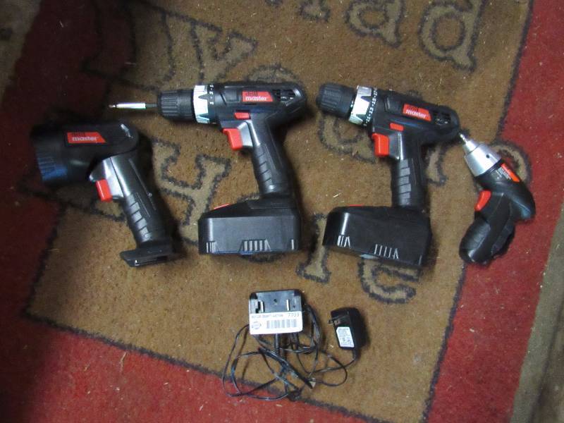 lot 7703 image: 4-piece Drill Master Drill Set with 2 - 18v drills, 1 - 18 volt flashlight & 1 - 4.6v Electric Screwdriver