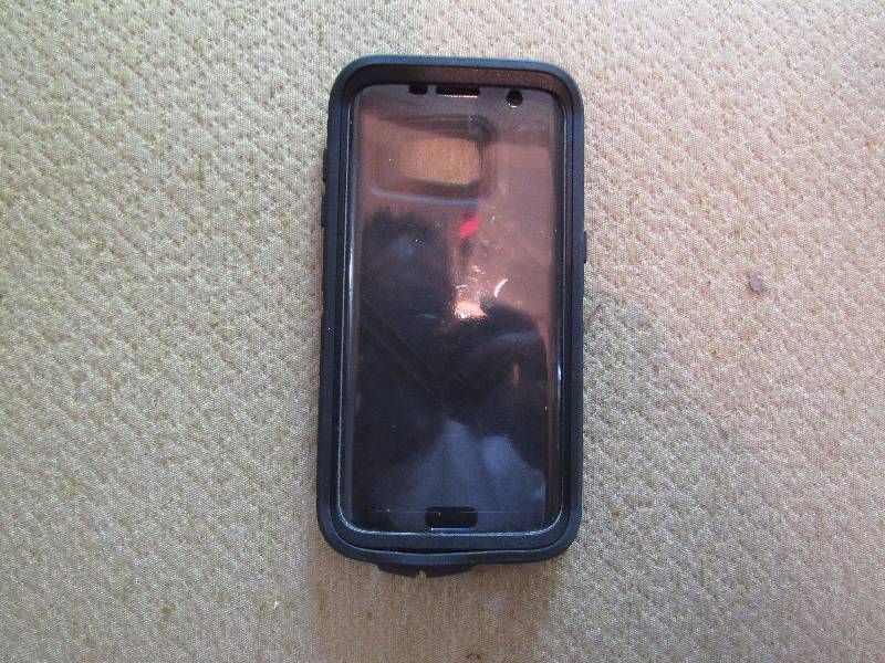 lot 7704 image: Black Otter Box Phone Case - Believed to be for iPhone