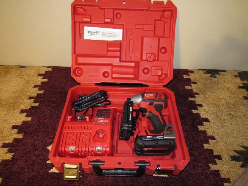 lot 7741 image: 18 Volt Impact Set Milwaukee in case - LIKE NEW