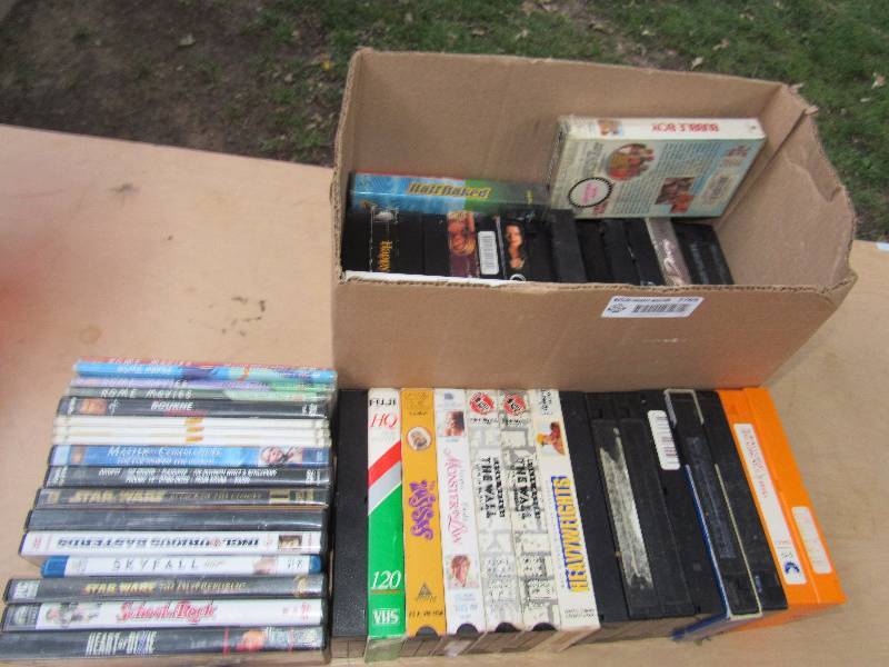 lot 7769 image: Lot of DVDs and VHS Tapes