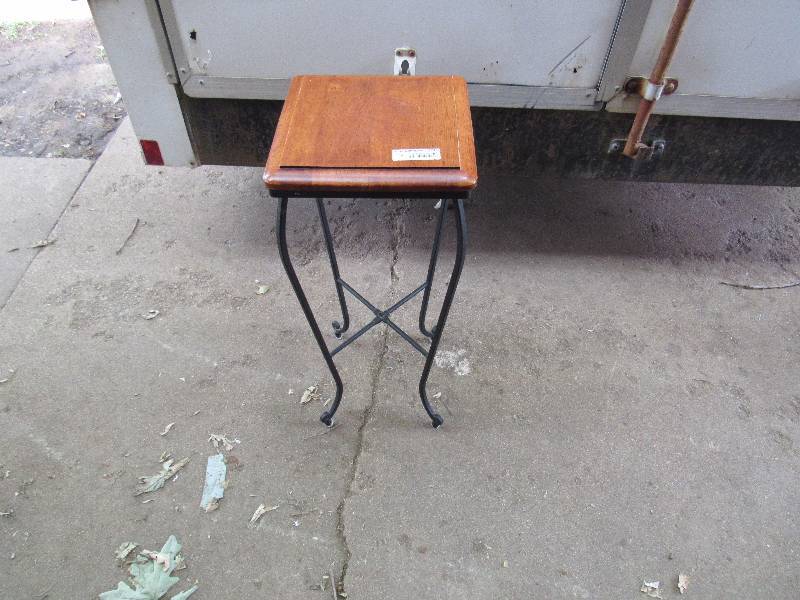 lot 7771 image: Plant Stand Wood and Iron  - has some scratched on the legs (see photo)