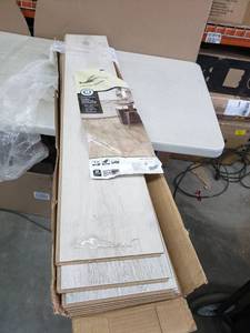 lot 2485 image: TrafficMaster 8pcs Laminate Flooring, 47.64x8.03x.27 Each