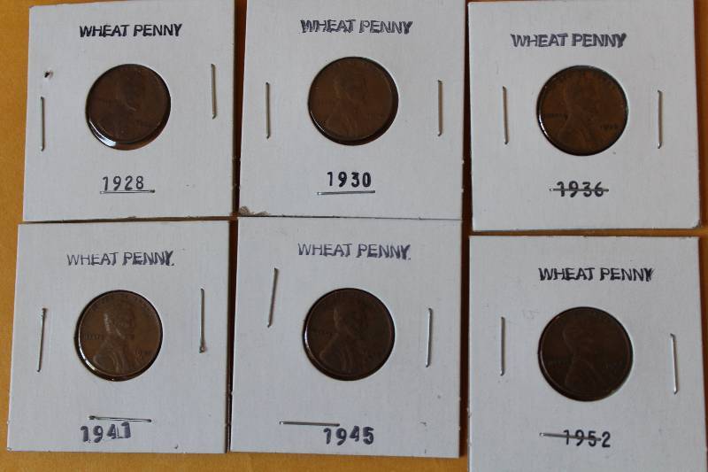 lot 8452 image: Lot of 6 Wheat Pennies - 1928, 1930, 1936, 1941, 1945, 1952 - in sleeves