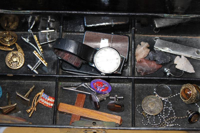 lot 8456 image: Jewelry Box and Contents - cuff links, arrowheads, watches, lighter, pins, rings, etc �