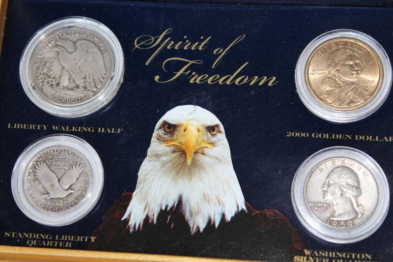 lot 8461 image: Coin Set - Spirit of Freedom - 1943 Walking Liberty Half Dollar (silver) - 1926 Standing Liberty Quarter (silver) - 1959 Washington Quarter (silver) - 2000 Golden Dollar