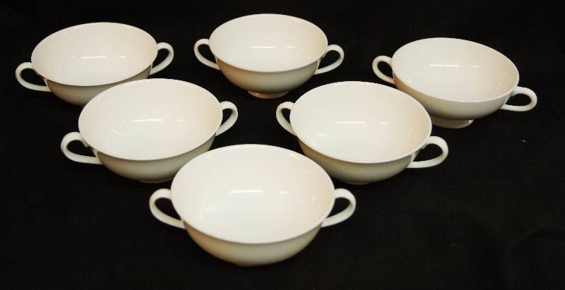 lot 2233 image: Lot of 6 china two handled soup bowls - white - nice - These have that fine china ting (one bowl has a chip on the base. Not too noticeable)
