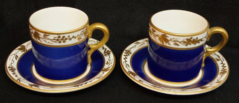 lot 2237 image: 4 piece Tea Cup and Saucer Set - Cobalt Blue and Gold on white - Very pretty No chips or cracks - Marked Italy on the bottom - TC20 - Gold accents are of grapes on a grapevine - Art Deco Feel