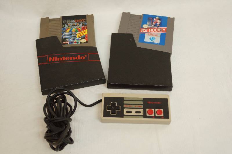 lot 4112 image: Lot of 2 Vintage Nintendo Games and One Controller. Games are Pin Bot and Ice Hockey