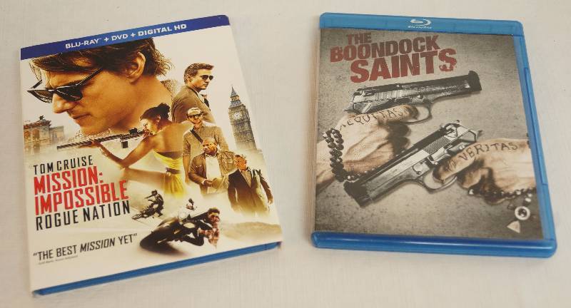 lot 4113 image: Lot of 2 Blue Ray DVD Movies - Book Dock Saints & Mission Impossible Rogue Nation - Discs and Cases are in excellent condition