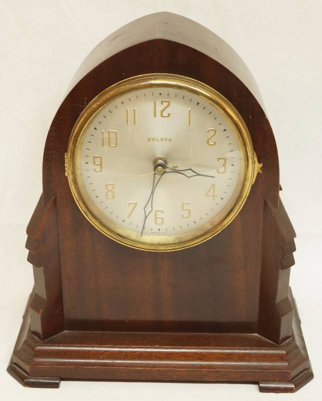 lot 4140 image: Vintage Bulova Clock Casing with electronic clock  (original clock removed)- Beautiful wood case thats in awesome condition