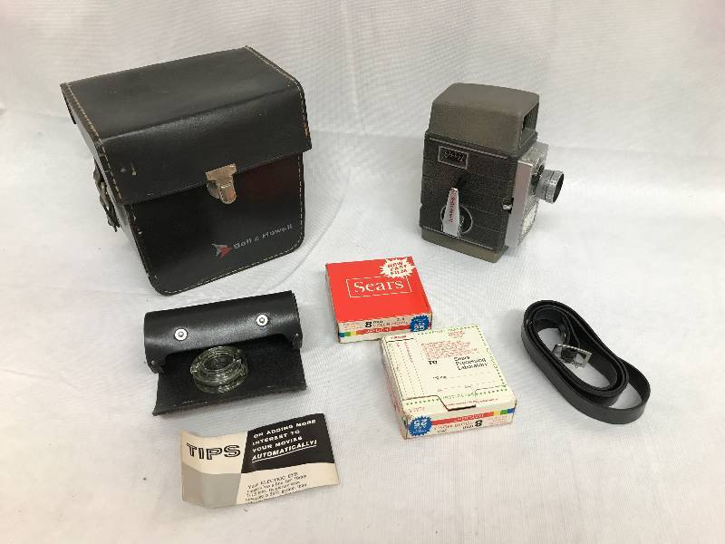 lot 2231 image: Vintage - 8mm movie camera - Bell & Howell - Electric Eye - with case and 2 boxes of film w canisters - see photos. NICE