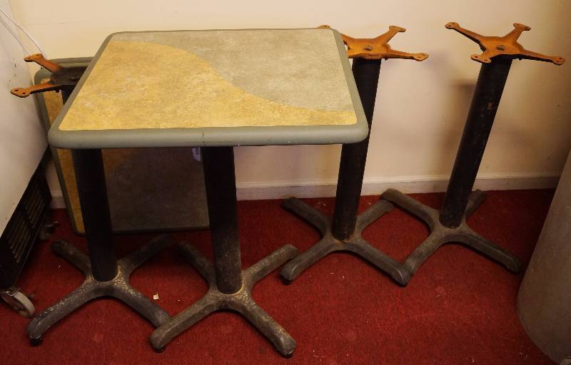 lot 4168 image: Lot of 4 matching restaurant tables - 2 seaters - Very Heavy  Sturdy - All table tops are in nice condition. Plumold Brand - Base is 29 high - table measure approx 24 x 20 x 2 thick NICE