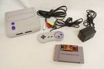 Vintage - Super NES - Nintendo Entertainment System - with cords and one game M# SNS-101 - tested and working when it was purchased a while ago. May need cleaned.