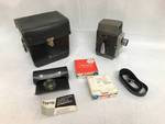 Vintage - 8mm movie camera - Bell & Howell - Electric Eye - with case and 2 boxes of film w/ canisters - see photos. NICE!