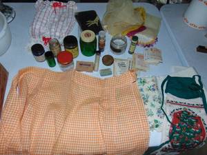 lot 4593 image: Seed jars, apron and hand towels