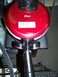 Red Oster Waffle Maker