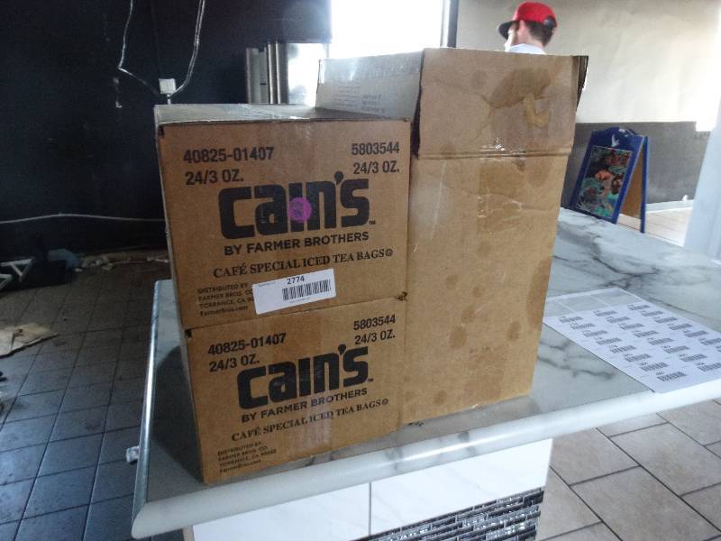 lot 2774 image: 2 boxes of ice tea bags, 1 box of coffee bags
