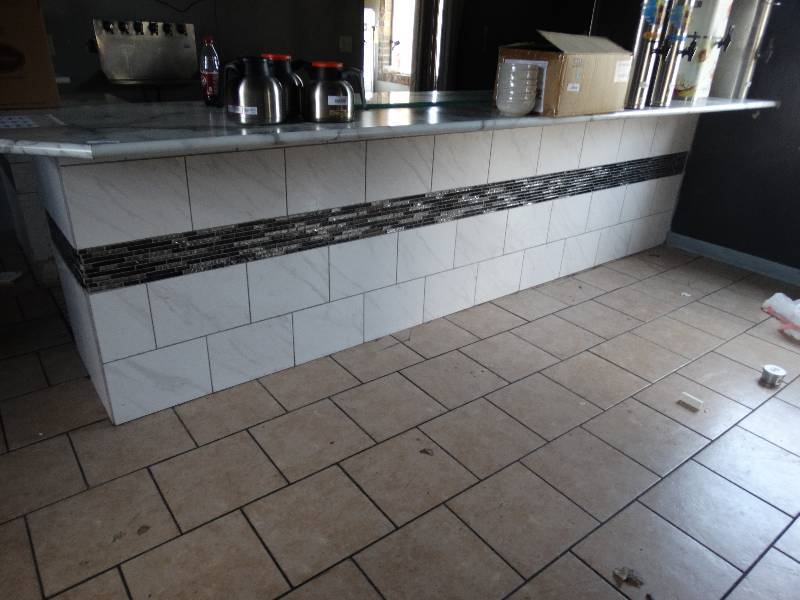 lot 2783 image: Custom built 13 foot bar with counter top