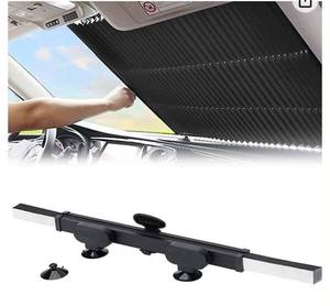 lot 55882 image: Retractable Windshield Sun Shade for Car, Large Sun Visor Protector Blocks 99% UV Rays to Keep Your Vehicle Cool, Auto Sunshade Fits Front Window of Various Models with Suction Cups 2021 New(Retail $27.87)