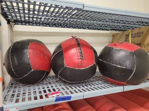 lot 1361 image: Lot of 3 Red and Black 14lb Medicine Exercise Balls