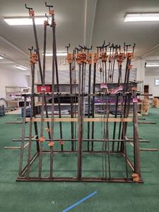 lot 12961 image: 6ft Iron Rack W 12 in Extensions on Both Ends - Holds Bar Clamps