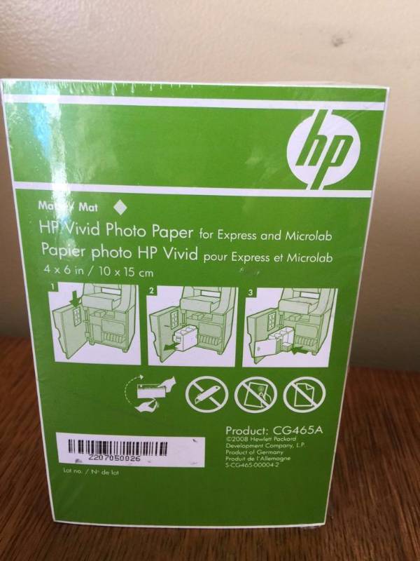 lot 197 image: Four packs of 180 sheets of HP photo paper 4x...