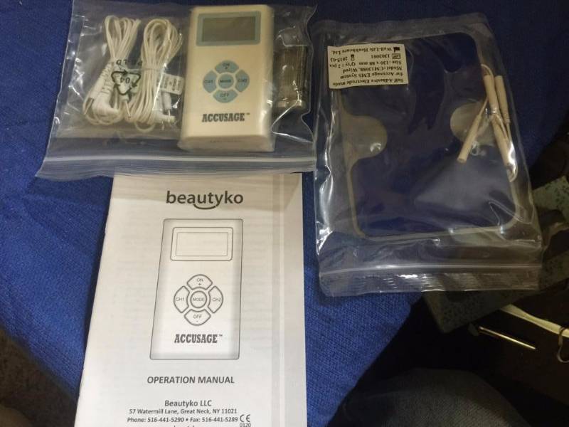 lot 56 image: Muscle massager for pain relief tens with uni...
