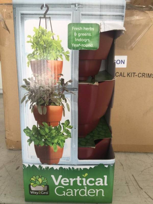 lot 661 image: Two new vertical garden planters as pictured...