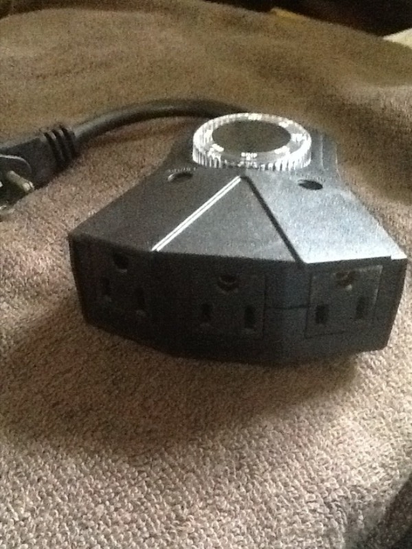 lot 7459 image: (2) photo timer plug in three items in to the unit dusk to dawn and can set it to different shutoff times