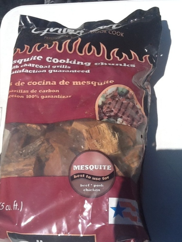 lot 7741 image: Five bags of mesquijte wood for smoking