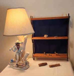 lot 1010 image: Cowboy Lamp, Ceramic 27 - Horseshoe and Wood Shelf 18 x 23 - Brass Dog and Petrified Wood