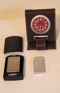 lot 1040 image: 2 Zippo Lighters, 1 new in case - Travel alarm Clock