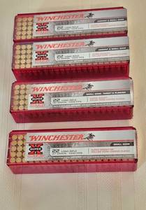 lot 1061 image: Winchester 2 Boxes 22 LR 40 grain 1435 FPS Hollow Point - 1 Box 22 LR 40 grain 1300 FPS Round Nose Copper Plated Super Speed - 1 Box 22 LR 37 grain 1330 FPS Super Speed HP Copper Plated