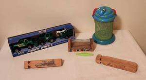 lot 1101 image: Mighty Wheels Set - 2 Bug Catchers - 2 Wood Train Whistles