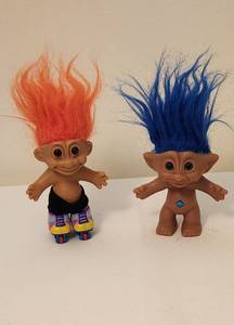 lot 1106 image: Vintage Ace Novelty Treasure Trolls - Blue Belly Gem & Orange on Roller Blades