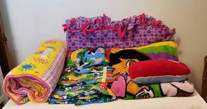 lot 1122 image: Children Blankets - Pillows - Nap Blanket - Animal Print 39x34 - Nap Blanket Yellow & Pink 50x43 (sm tear) - Dora Blanket & Pillow 36x46 - Handmade Purple & Pink Blanket 48x54