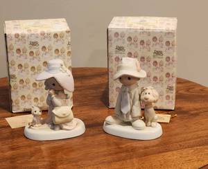 lot 1144 image: 2 Precious Moment Figurines - To A Special Mom - To A Special Dad