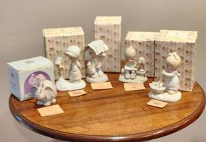 lot 1145 image: 5 Precious Moments Figurines - 1 Birthday Series, Shower of Blessings - 4 others, Blessing From My House To Yours - Sending You Showers of Blessings, Loving Is Sharing, Let Love Reign