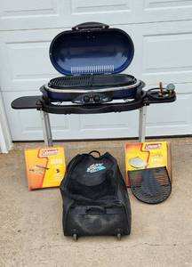 lot 2000 image: Coleman Road Trip Grill with Extra Grill and Stove Grate - Model 9941-455