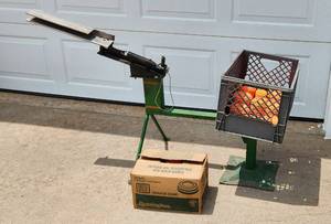lot 2009 image: Clay Pidgeon Thrower 54 x 19 - Crate is attached to hold clays - Includes clays and extra Clay Pigeons in Box (these are old)
