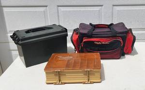 lot 2020 image: 3 Tackle Boxes and Fishing Supplies - Shakespeare Canvas Ugly Tackle Bag 22 x 12 with 4 Plastic Tackle Containers, Plano Model 1122 (15.6 x 9) Double-sided and MTM Sportsman Dry Box 15 x 9 x 9.6