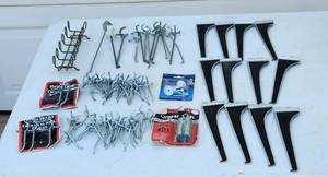 lot 2027 image: Peg Board Hooks and 8 Shelf Supports