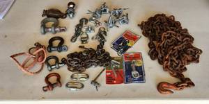 lot 2038 image: 19ft Logging Chain, Clevis Hooks, 1 78 Trailer Ball and Snap Hooks