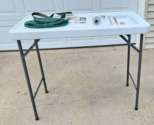 lot 2049 image: Tricam MT-2 Folding Fish and Game Table 44 x 24,Fishing Bag and Hooks