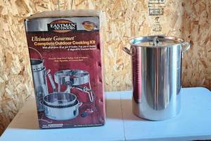 lot 2061 image: Eastman Outdoors Ultimate Gourmet Cooking Kit (Stainless Steel Pot used 1 time) Most all other items are new. See Pictures for items in box.